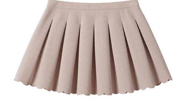 Isolated beige pleated skirt fashion apparel